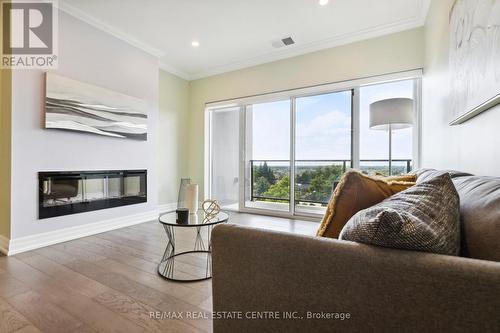 308 - 1878 Gordon Street, Guelph, ON - Indoor Photo Showing Living Room With Fireplace