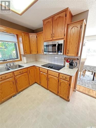 2140 Proton Avenue, Gull Lake, SK - Indoor Photo Showing Kitchen With Double Sink