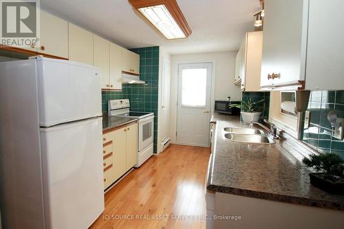 30 The Cove Road, Clarington, ON - Indoor Photo Showing Kitchen With Double Sink