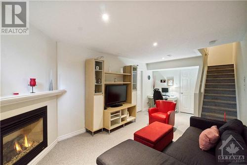 136 Marrissa Avenue, Ottawa, ON - Indoor Photo Showing Living Room With Fireplace