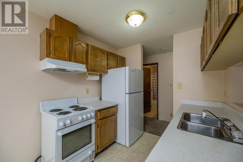 210 392 Killoren Crescent, Prince George, BC - Indoor Photo Showing Kitchen With Double Sink