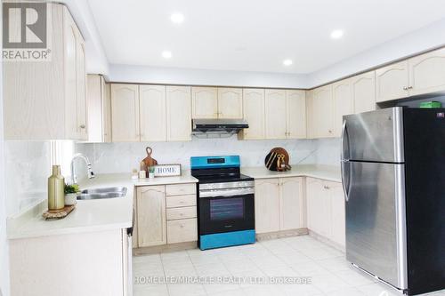 9 Native Landing, Brampton, ON - Indoor Photo Showing Kitchen With Double Sink