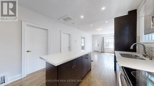 86 Bloor Street W, Oshawa, ON - Indoor Photo Showing Kitchen With Double Sink