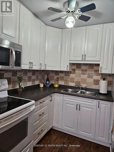 G - 1 Prince Of Wales Drive, Belleville, ON - Indoor Photo Showing Kitchen With Double Sink