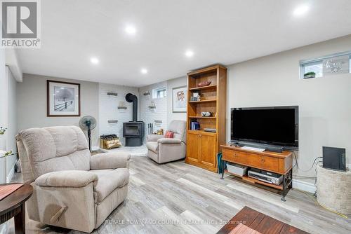 7 Donelda Court, Scugog (Blackstock), ON - Indoor Photo Showing Basement With Fireplace