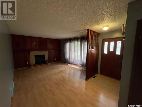 65 Bellamy Avenue, Birch Hills, SK - Indoor With Fireplace