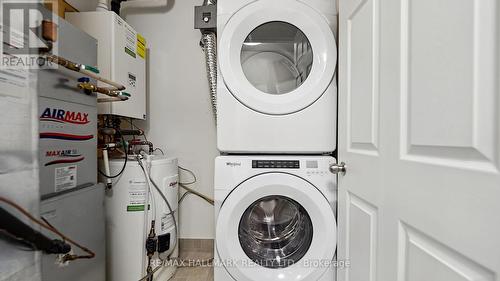 220 - 500 Kingbird Grove, Toronto, ON - Indoor Photo Showing Laundry Room