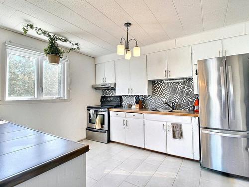 Kitchen - 9716  - 9720 Boul. Rideau, Rouyn-Noranda, QC - Indoor Photo Showing Kitchen With Double Sink