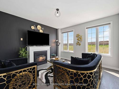 316 Windfields Farm Dr W, Oshawa, ON - Indoor Photo Showing Living Room With Fireplace