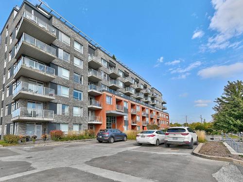 ExtÃ©rieur - 304-100 Rue Cartier, Saint-Lambert, QC - Outdoor With Facade