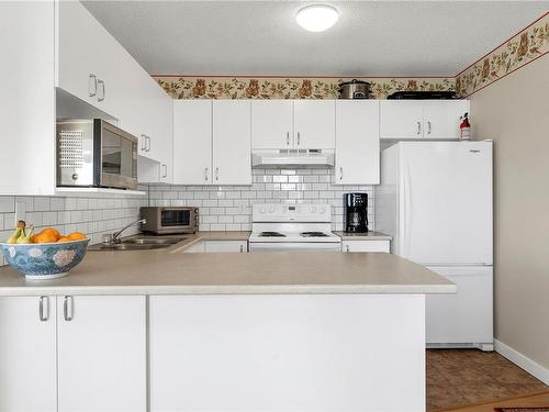 203B-670 Island Hwy South, Campbell River, BC - Indoor Photo Showing Kitchen With Double Sink