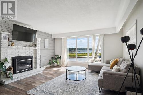 42 Lighthouse Crescent, Tay, ON - Indoor Photo Showing Living Room With Fireplace