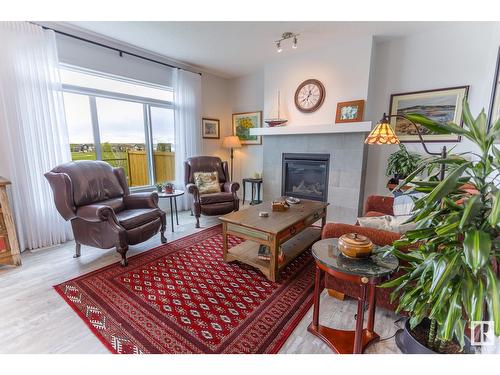 17115 46 St Nw, Edmonton, AB - Indoor Photo Showing Living Room With Fireplace