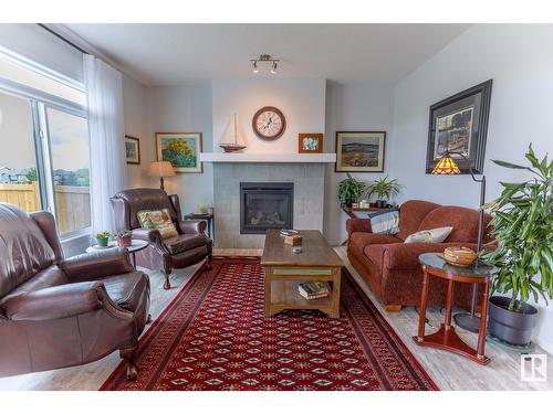 17115 46 St Nw, Edmonton, AB - Indoor Photo Showing Living Room With Fireplace