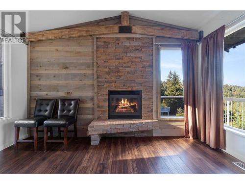 2592 Alpen Paradies Road Unit# 10, Blind Bay, BC - Indoor Photo Showing Living Room With Fireplace