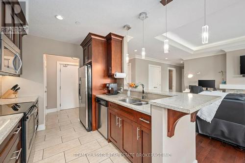 414 - 320 Sugarcreek Trail, London, ON - Indoor Photo Showing Kitchen With Double Sink With Upgraded Kitchen