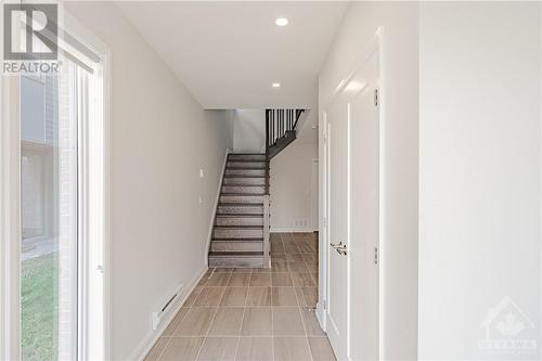 garage door and - 143 Boundstone Way, Kanata, ON - Indoor Photo Showing Other Room