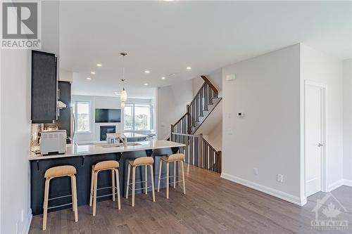 dining room and no rear neighbours backyard - 143 Boundstone Way, Kanata, ON - Indoor Photo Showing Other Room