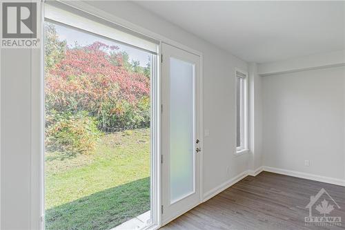 dining room and no rear neighbours backyard - 143 Boundstone Way, Kanata, ON - Indoor Photo Showing Other Room