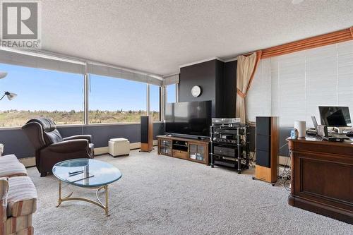 1002A, 500 Eau Claire Avenue Sw, Calgary, AB - Indoor Photo Showing Living Room