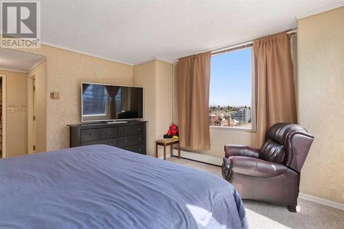 1002A, 500 Eau Claire Avenue Sw, Calgary, AB - Indoor Photo Showing Bedroom