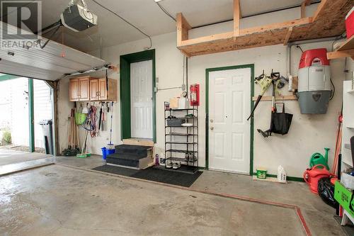 Attached garage door to yard - 168, 37543 England Way, Rural Red Deer County, AB 