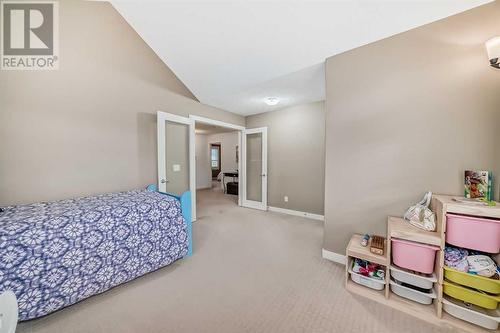 11 Crestridge Way Sw, Calgary, AB - Indoor Photo Showing Bedroom