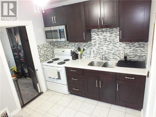 101 Albany Avenue, Hamilton, ON - Indoor Photo Showing Kitchen With Double Sink