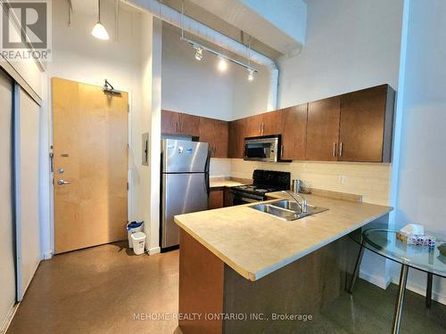 111 - 404 King Street W, Kitchener, ON - Indoor Photo Showing Kitchen With Double Sink