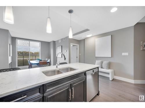 #102 11080 Ellerslie Rd Sw, Edmonton, AB - Indoor Photo Showing Kitchen With Double Sink