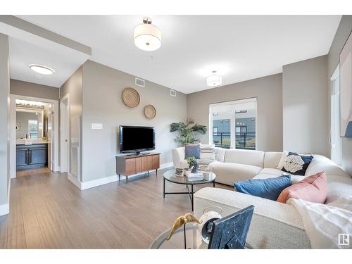 #102 11080 Ellerslie Rd Sw, Edmonton, AB - Indoor Photo Showing Living Room