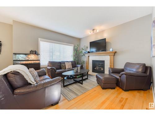 21906 94A Av Nw, Edmonton, AB - Indoor Photo Showing Living Room With Fireplace