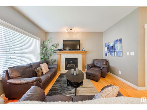 21906 94A Av Nw, Edmonton, AB - Indoor Photo Showing Living Room With Fireplace