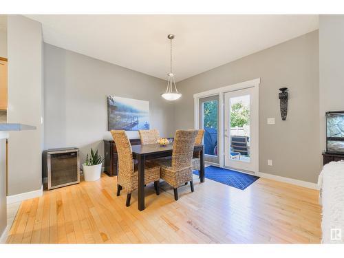 21906 94A Av Nw, Edmonton, AB - Indoor Photo Showing Dining Room With Fireplace