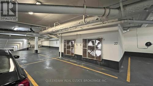 102 - 15 Zorra Street, Toronto, ON - Indoor Photo Showing Garage