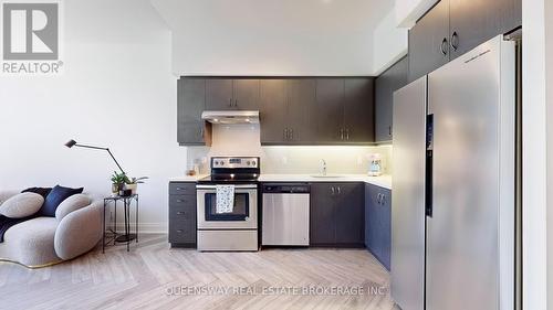 102 - 15 Zorra Street, Toronto, ON - Indoor Photo Showing Kitchen With Stainless Steel Kitchen