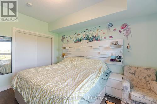 402 - 69 Boyne Street N, New Tecumseth, ON - Indoor Photo Showing Bedroom