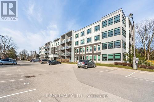 402 - 69 Boyne Street N, New Tecumseth, ON - Outdoor With Balcony With Facade