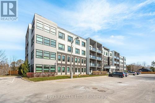 402 - 69 Boyne Street N, New Tecumseth, ON - Outdoor With Balcony With Facade