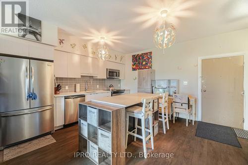 402 - 69 Boyne Street N, New Tecumseth, ON - Indoor Photo Showing Kitchen With Stainless Steel Kitchen