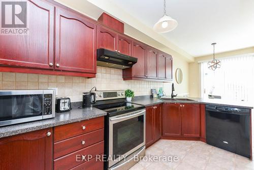 93 Nathaniel Crescent, Brampton, ON - Indoor Photo Showing Kitchen With Double Sink