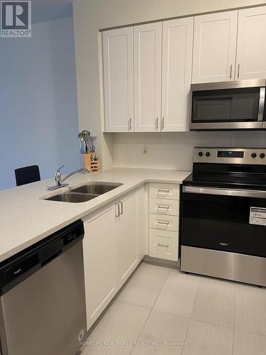 912 - 349 Rathburn Road W, Mississauga, ON - Indoor Photo Showing Kitchen With Double Sink