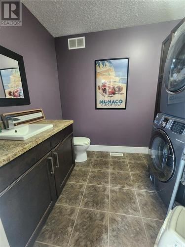 Schenher Acreage, Weyburn Rm No. 67, SK - Indoor Photo Showing Laundry Room