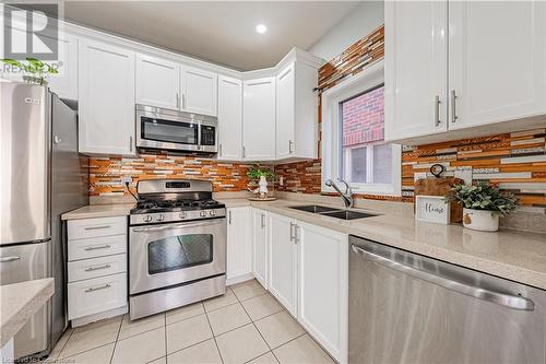 4264 Vivaldi Road E, Burlington, ON - Indoor Photo Showing Kitchen With Double Sink