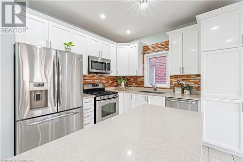 4264 Vivaldi Road E, Burlington, ON - Indoor Photo Showing Kitchen With Double Sink With Upgraded Kitchen