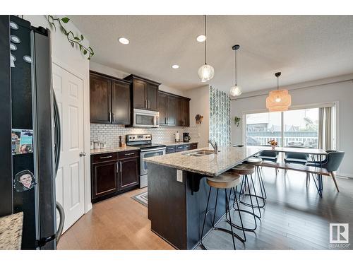 7819 173 Av Nw, Edmonton, AB - Indoor Photo Showing Kitchen With Stainless Steel Kitchen With Double Sink With Upgraded Kitchen