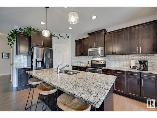 7819 173 Av Nw, Edmonton, AB - Indoor Photo Showing Kitchen With Stainless Steel Kitchen With Double Sink With Upgraded Kitchen