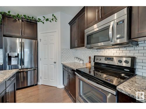 7819 173 Av Nw, Edmonton, AB - Indoor Photo Showing Kitchen With Stainless Steel Kitchen With Upgraded Kitchen