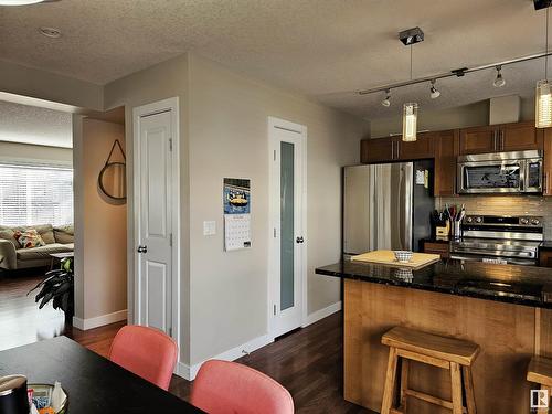 #12 13810 166 Av Nw, Edmonton, AB - Indoor Photo Showing Kitchen With Stainless Steel Kitchen