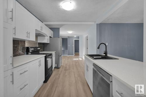 13504 66 St Nw, Edmonton, AB - Indoor Photo Showing Kitchen With Double Sink